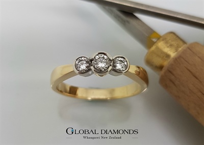 9ct Gold Rubover Set Diamond Three Stone Ring